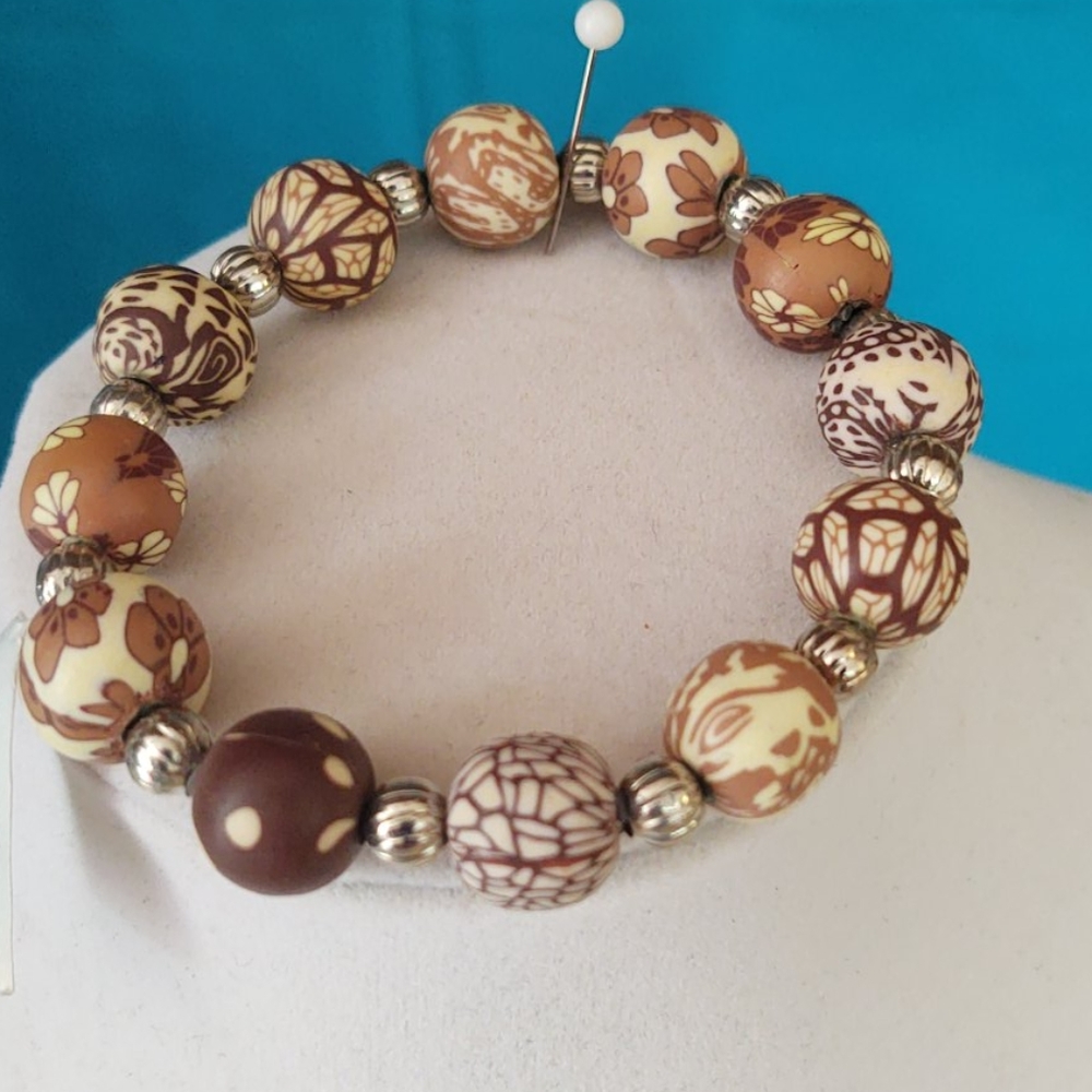 Bracelet clay and sliver beads coffee colors